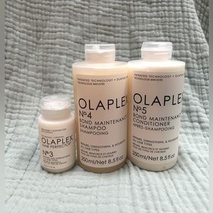 New OLAPLEX No.4 bond shampoo, No.5 bond conditioner, and No.3 hair Perfector